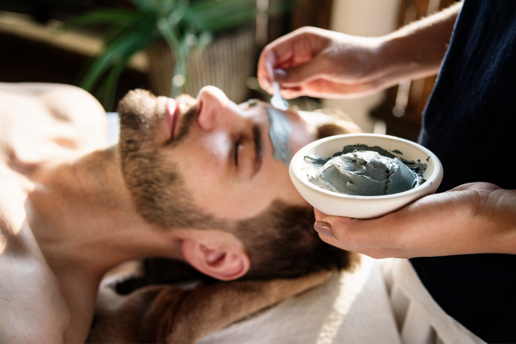 picture of man receiving a facial at Bodies Kneaded Massage Spa South Beach Miami Since 1996 www.BodiesKneaded.com 305.535.2424